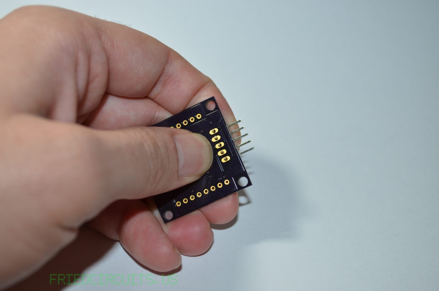 Hold male header in alignment for soldering